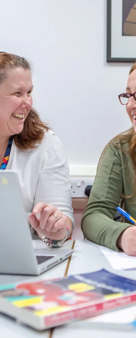 A joyful interaction captured between a Glasgow Kelvin College lecturer and student, emphasising the positive, welcoming learning environment. A joyful interaction captured between a Glasgow Kelvin College lecturer and student, emphasising the positive, welcoming learning environment.